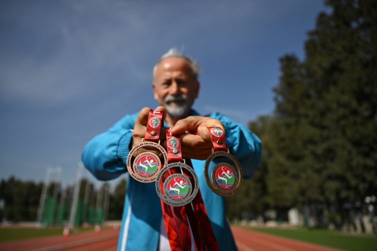 Kalp ameliyatı ve kansere rağmen koştu, Türkiye rekorunu kırdı
