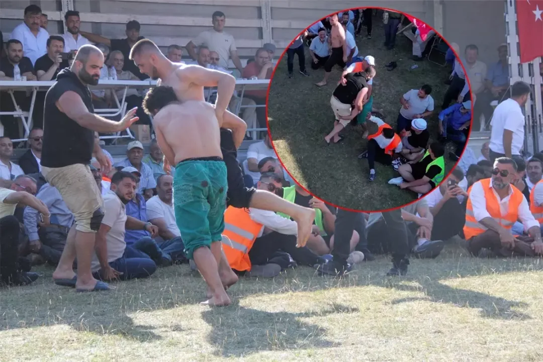 Seyircilerin arasına taşan güreşte rakibini karıştırıp seyirciye daldı!